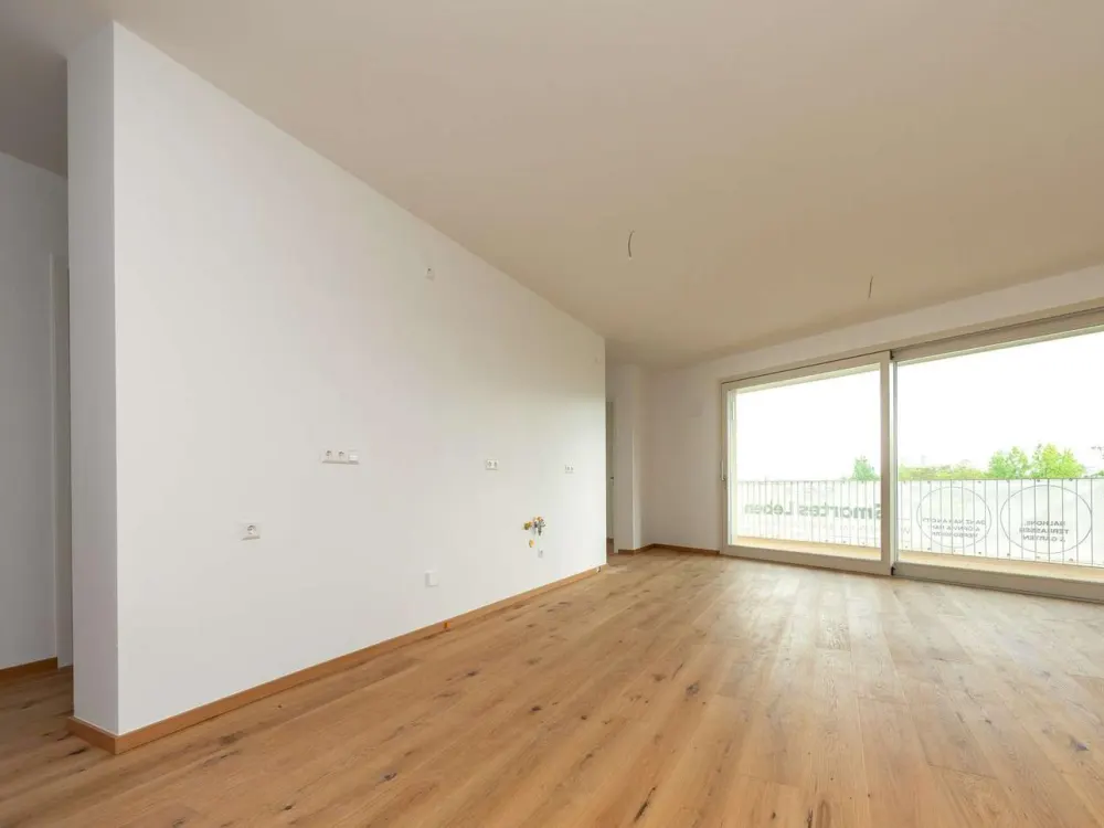 Erstbezug im Neubau - Wohnung mit traumhaft großem umlaufenden Balkon