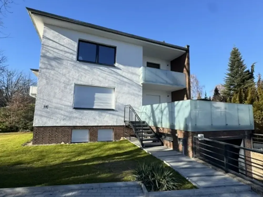 Erstbezug exklusive 4-Zimmer Maisonette mit eigenem Garten, 2 Bädern, großzügiger Terrasse