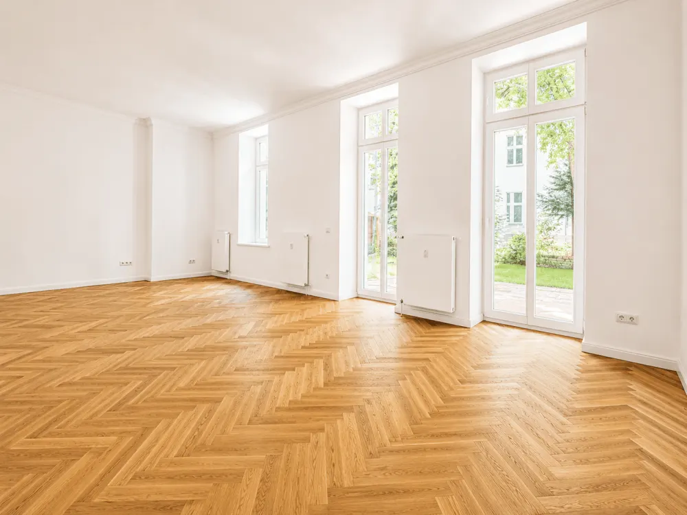Seltene 4-Zimmer-Gartenwohnung mit ca. 173 m² Privatgarten, direkt am Adenauerplatz!