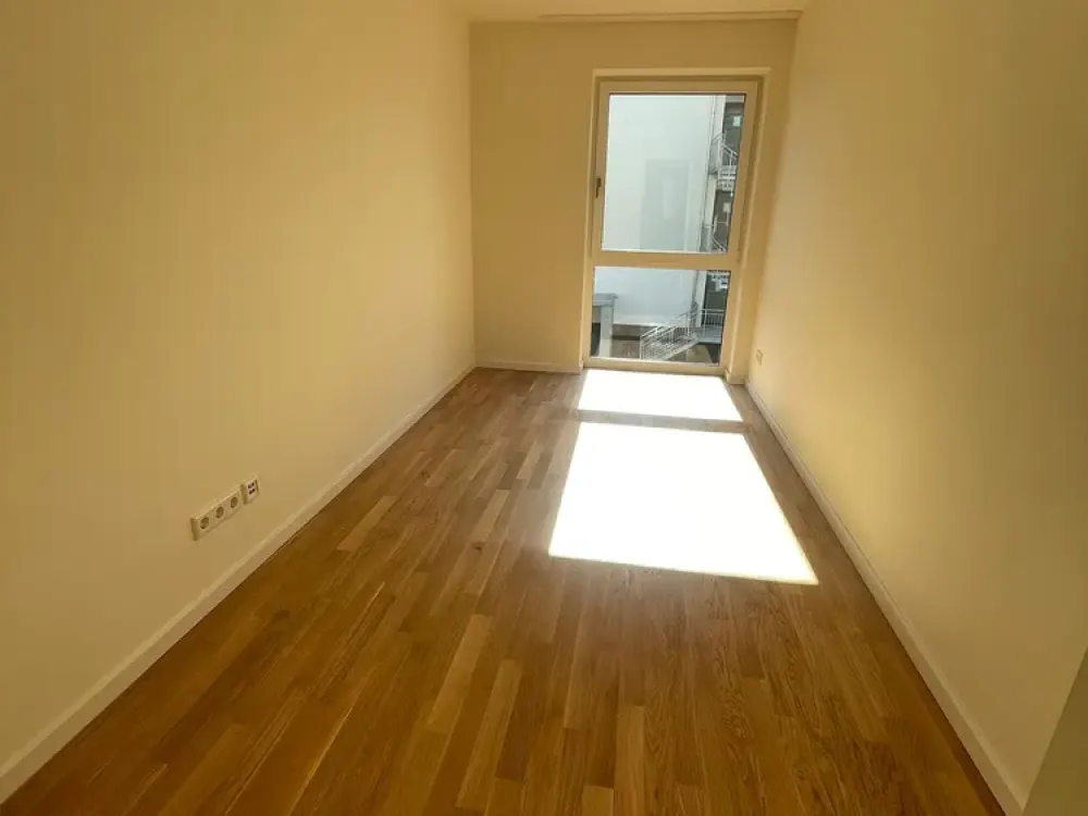 KfW 40 New-Build Apartment with Fitted Kitchen, South Balcony, Real Wood Parquet, Elevator, Underground Parking