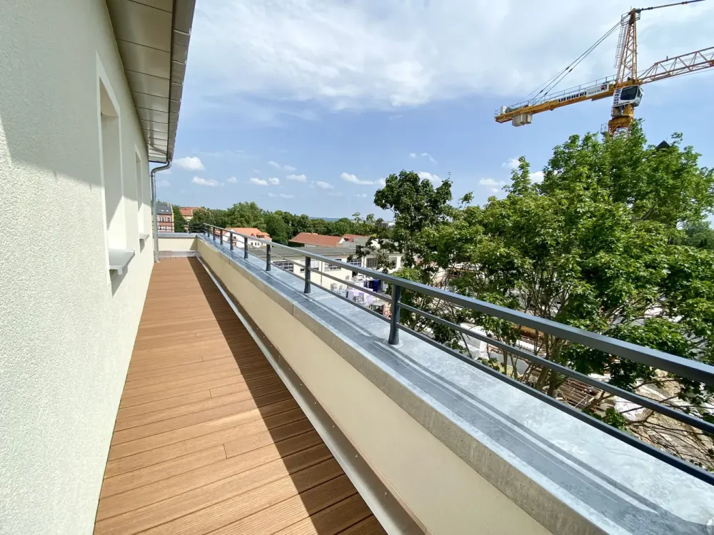 modern penthouse apartment with wrap-around roof terrace and fitted kitchen