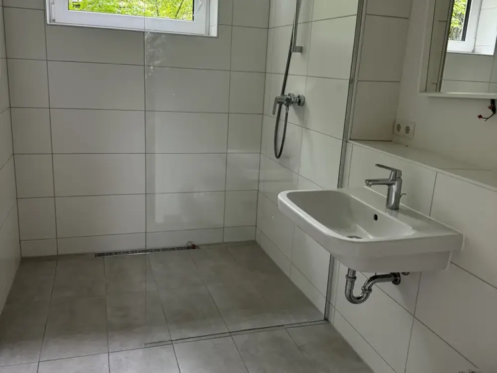 Neubau: Moderne 3-Zimmer-Wohnung mit eigenem Gartenanteil