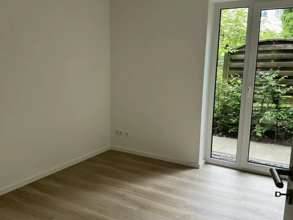 Neubau: Moderne 3-Zimmer-Wohnung mit eigenem Gartenanteil