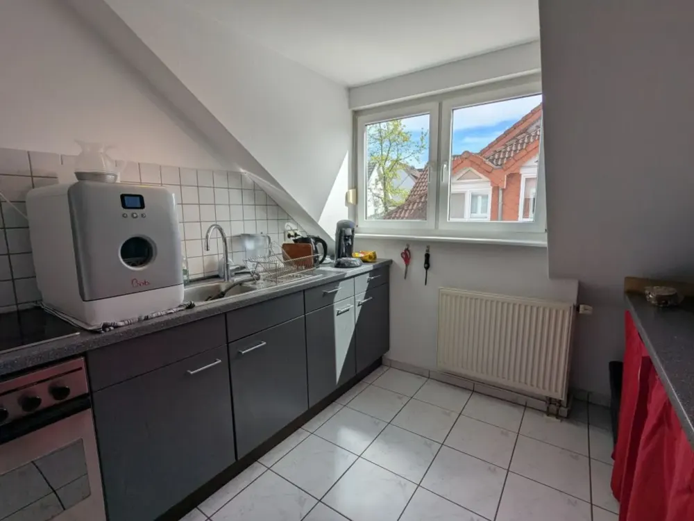 Beautiful 3-Room Attic Apartment in Quiet Location with Underground Parking Space