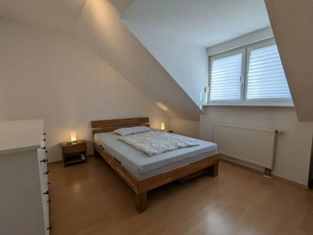 Beautiful 3-Room Attic Apartment in Quiet Location with Underground Parking Space
