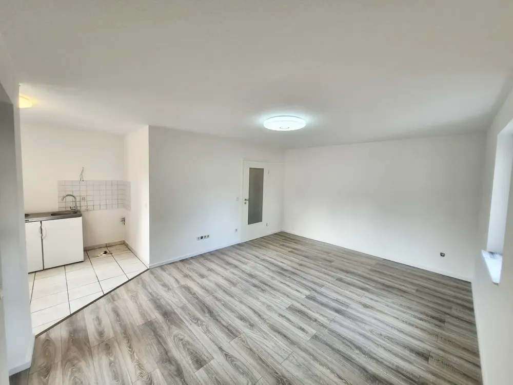Frisch renoviertes 1-Zimmer-Apartment mit Balkon, neuer EBK & TG-Stellplatz (krzfr. Bezug mögl.)