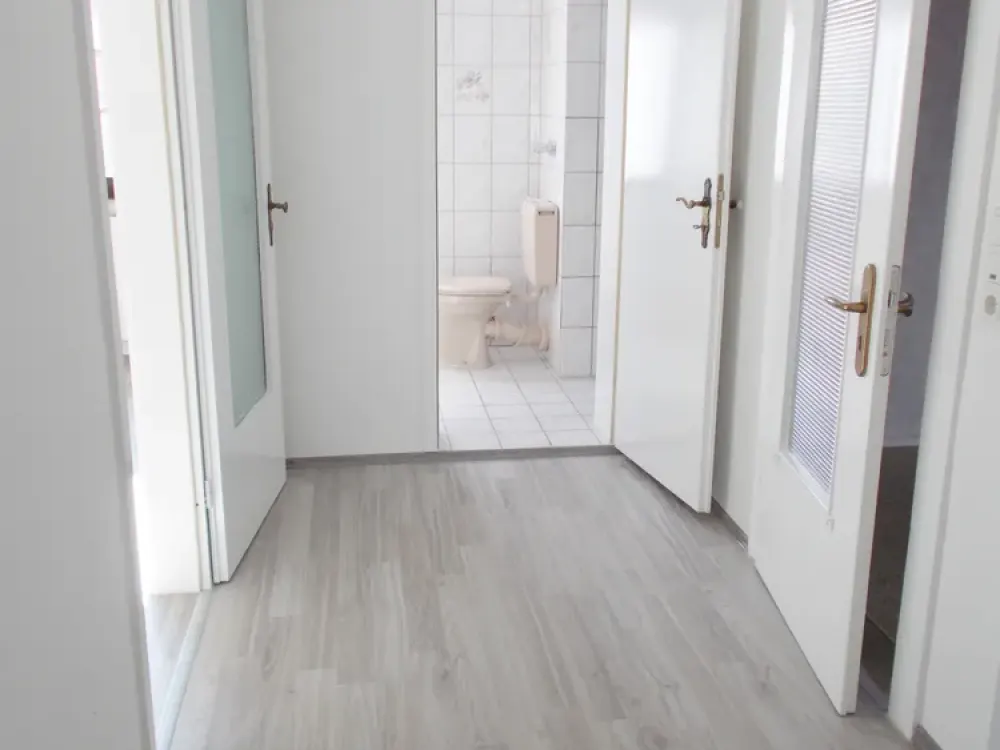 HEUSENSTAMM: 3 ZW m. Sonnengarten in 3 Fam.Haus