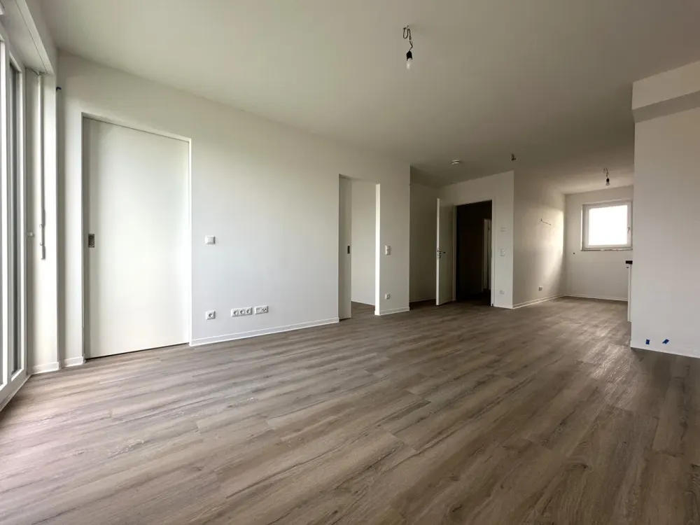 New Build! Stylish 2-Room Penthouse Apartment with Terrace & Fitted Kitchen in Zentrum-Ost