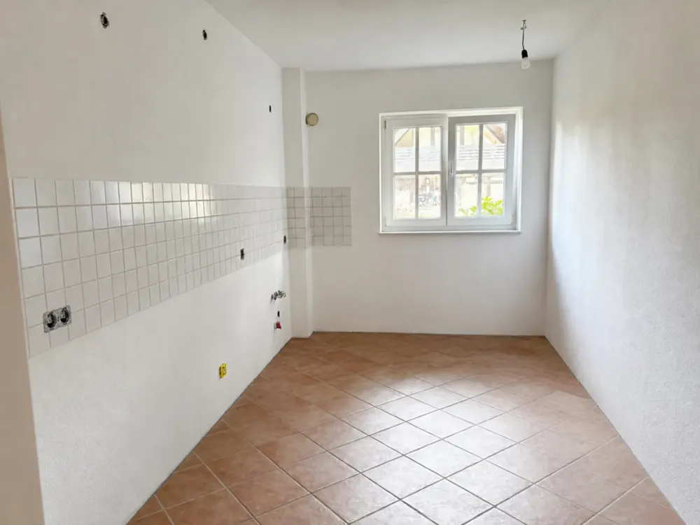 Hittfeld: schöne 3-Zimmer-Wohnung mit Terrasse und Garten.