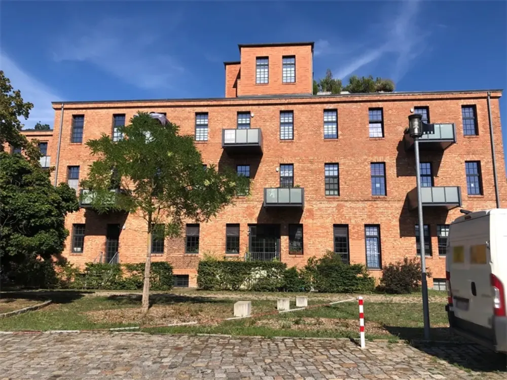 Großzügige 2-Zimmer-Wohnung mit Terrasse in der ehem. Kodak Glanzfilmfabrik!