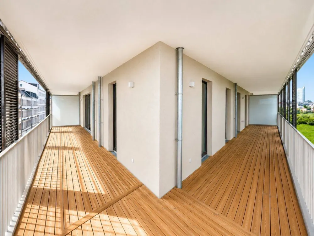Erstbezug im Neubau - Wohnung mit traumhaft großem umlaufenden Balkon