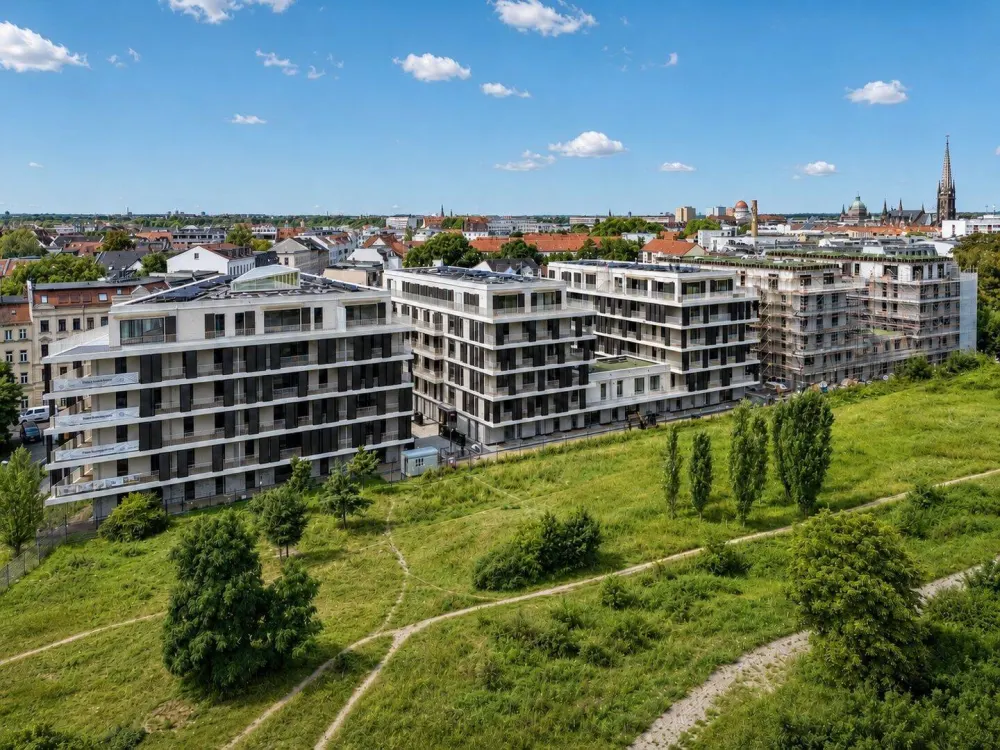 Erstbezug im Neubau - Wohnung mit traumhaft großem umlaufenden Balkon