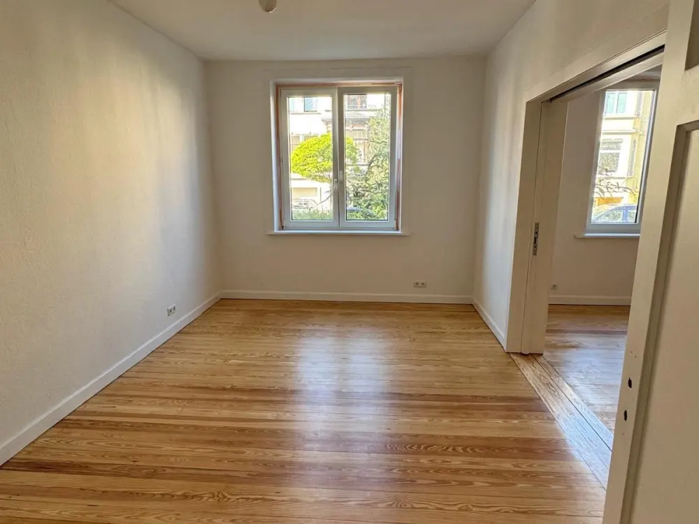 Kernsanierte 3-Zimmer-Wohnung mit Balkon und idyllischem Gartenbl