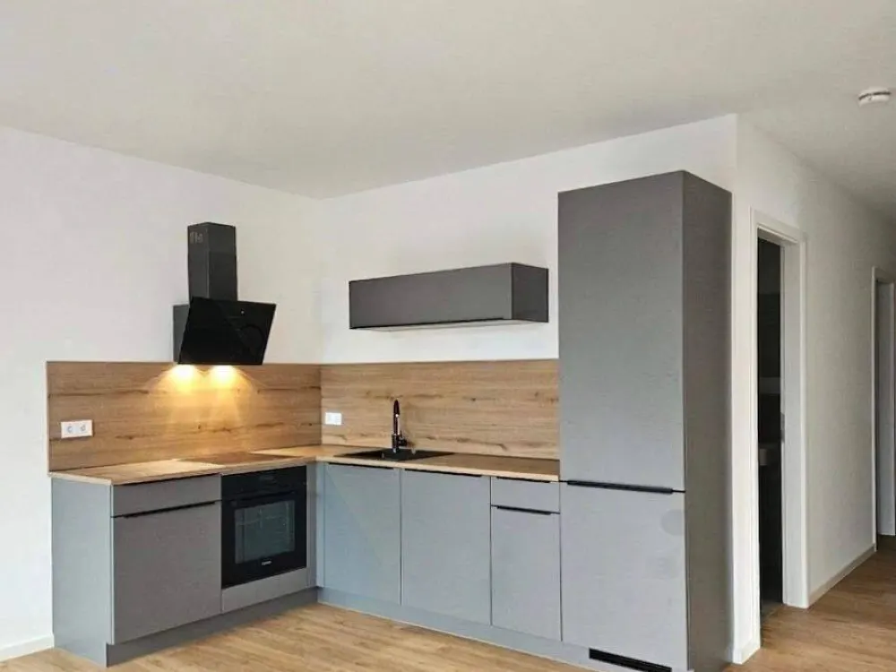Neubaukomfort im Erstbezug: Helle 3-Zimmerwohnung mit zwei Balkonen, EBK und Tiefgaragenstellplatz