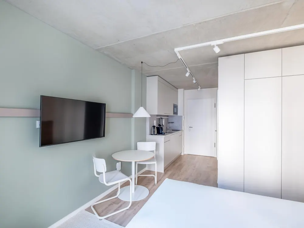 Modernes Studioapartment mit Gym, Coworking & Rooftop am Schloss Charlottenburg
