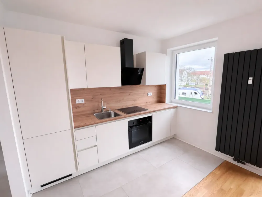 ERSTBEZUG! Hochwertige 2-Zimmer-Wohnung mit Einbauküche & Parkett, zentrale Lage Ecke Parkallee