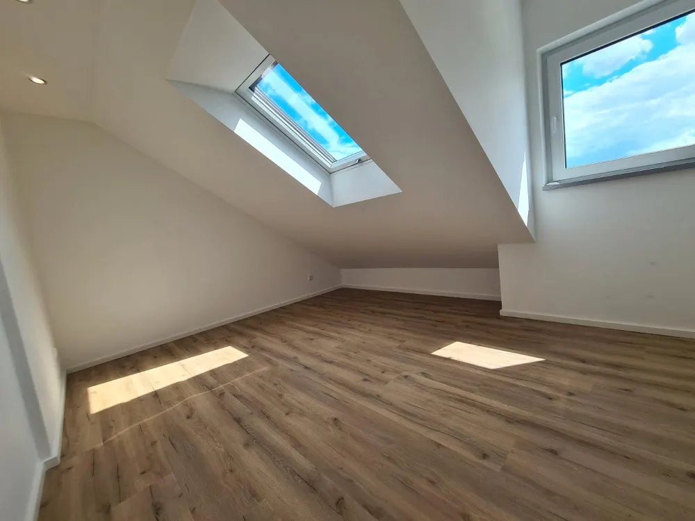 Neubau Erstbezug Helle 2-Zimmer Dachgeschoss mit Balkon Mörfelden