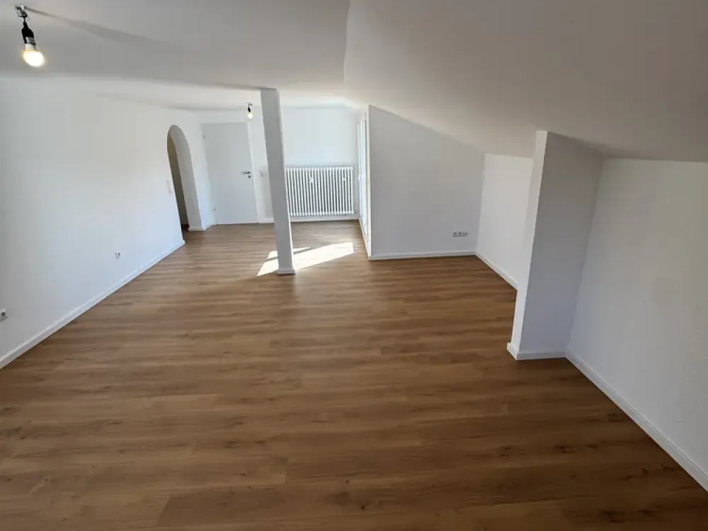 Charming, fully renovated 3-room attic apartment with loggia