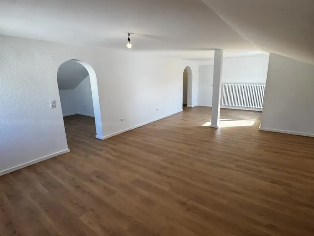 Charming, fully renovated 3-room attic apartment with loggia