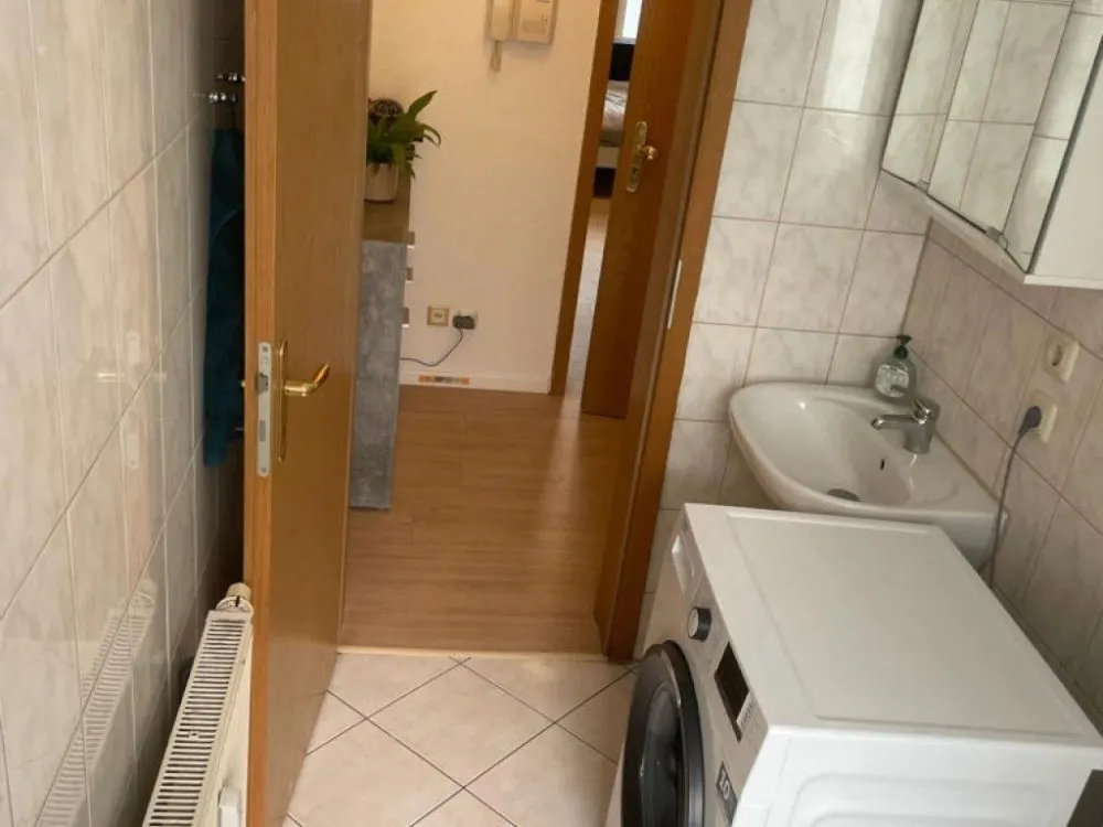 Vollmöblierte 1-Zimmer-Wohnung mit Einbauküche, WLAN und Gartennu