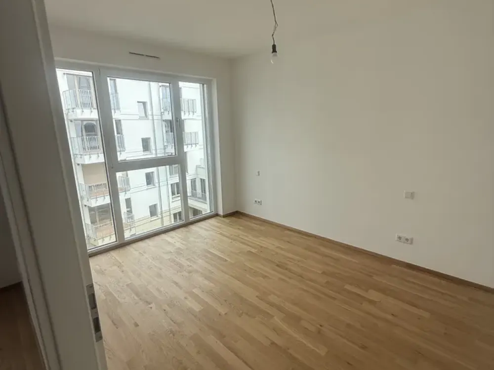 Stilvolle 2-Zimmer-Neubauwohnung mit hochwertiger Einbauküche, Balkon und Fußbodenheizung