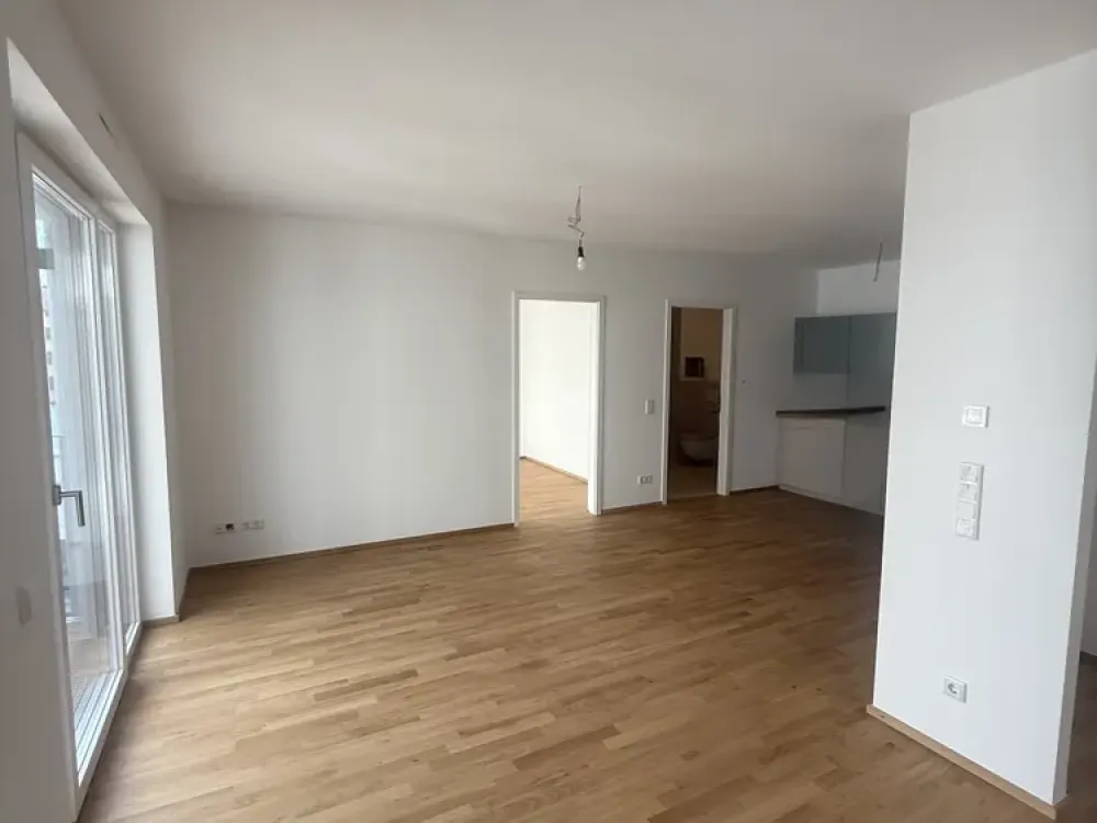 Stilvolle 2-Zimmer-Neubauwohnung mit hochwertiger Einbauküche, Balkon und Fußbodenheizung