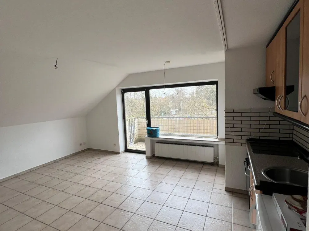 2-Zimmer-Dachgeschosswohnung mit Balkon in Langenfeld-Richrath