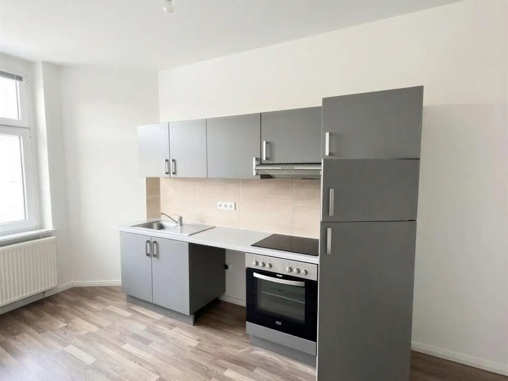Ganz oben zuhause, Helle 2-Zimmer-Wohnung mit Weitblick und modernem Wohnkomfort