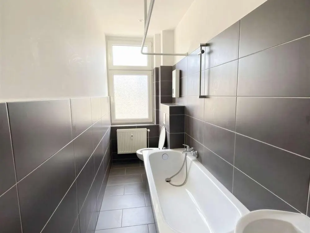 Ganz oben zuhause, Helle 2-Zimmer-Wohnung mit Weitblick und modernem Wohnkomfort