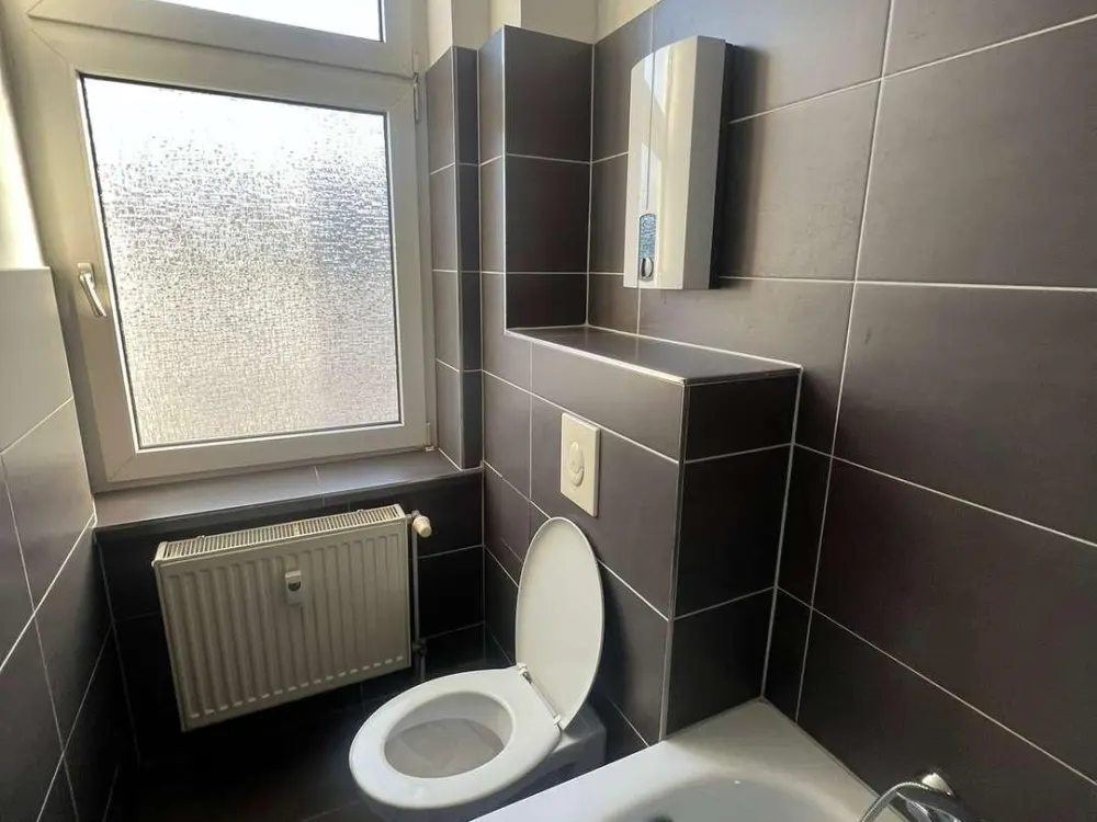 Ganz oben zuhause, Helle 2-Zimmer-Wohnung mit Weitblick und modernem Wohnkomfort
