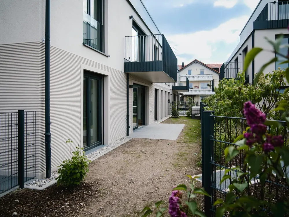 Stilvolle 3-Zimmer-Neubauwohnung mit eigenem Garten