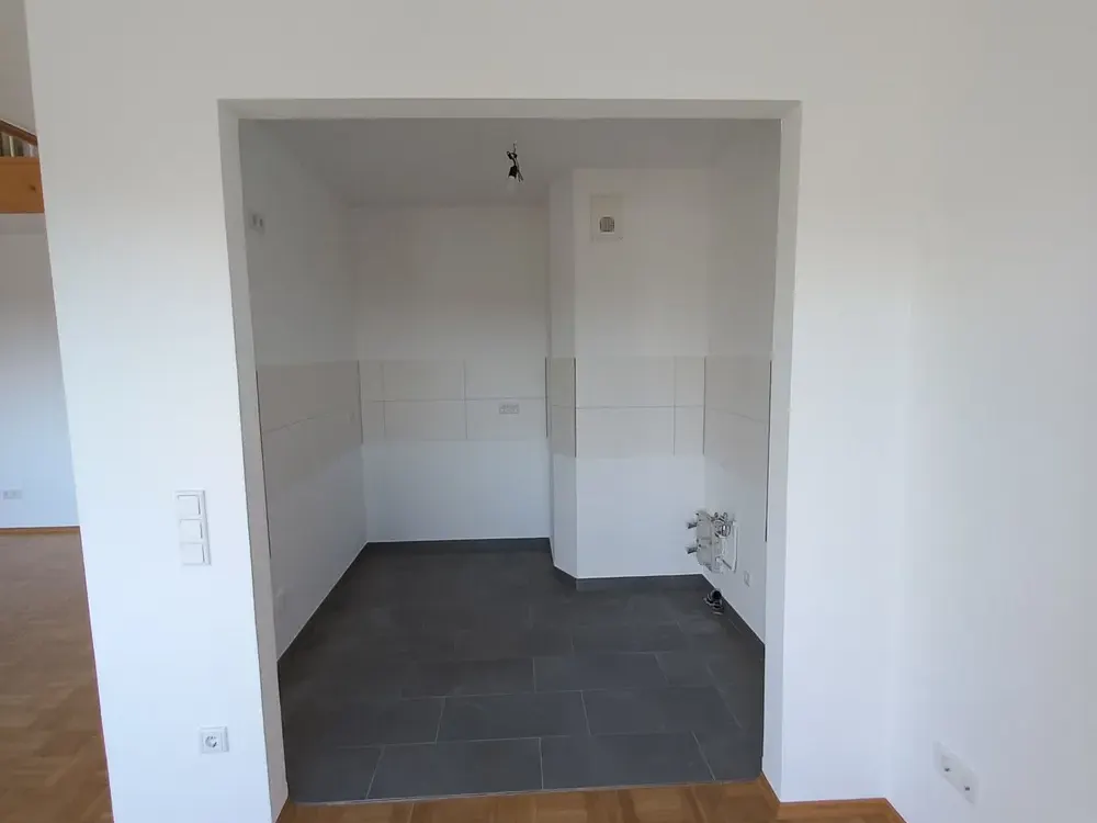 Loft-Feeling pur: Helle Galeriewohnung mit beeindruckendem Wohnraum in Oberursel (Taunus)