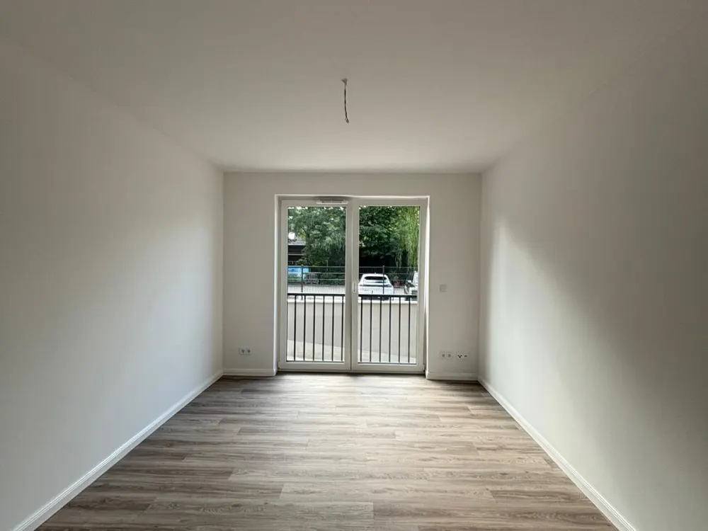 Neubau: Exklusive 3-Zi.-Whg. (ca. 83 m²) mit Loggia + Stellplatz