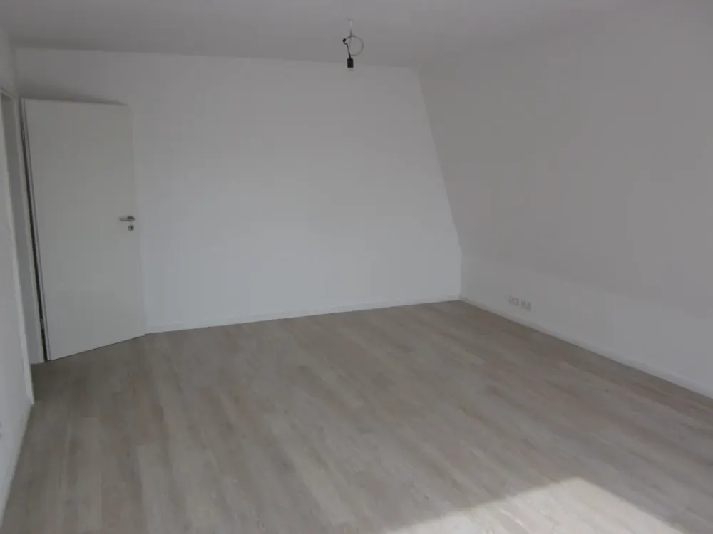 Top renovated 1-room attic apartment with separate fitted kitchen