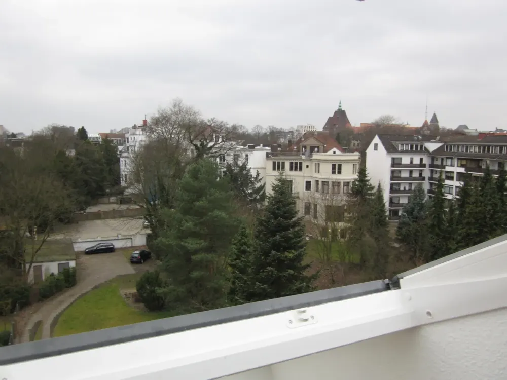 Top renovated 1-room attic apartment with separate fitted kitchen
