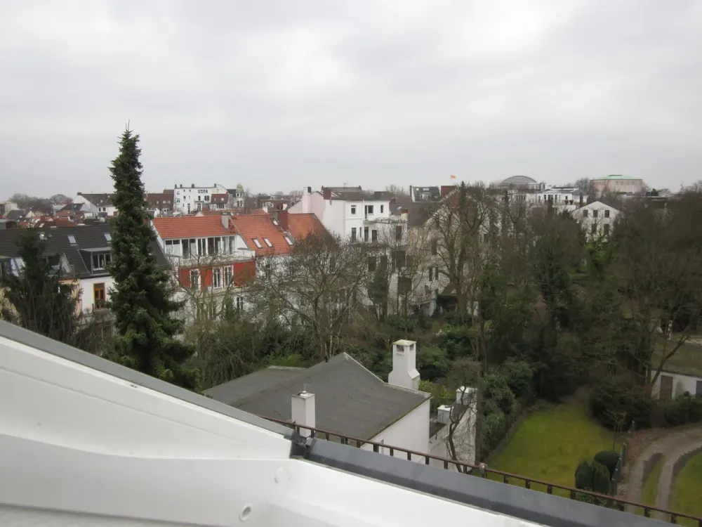 Top renovated 1-room attic apartment with separate fitted kitchen