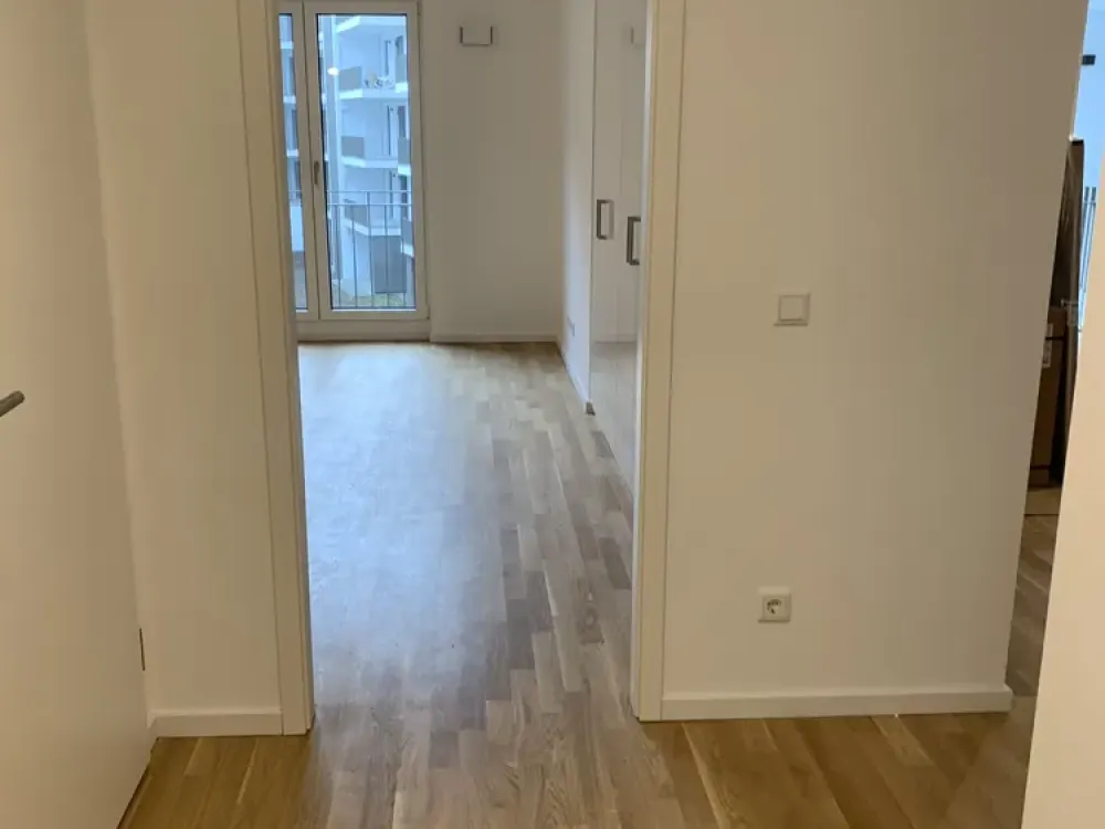 Neubau: 2-Zi-Wohn, Balkon, EBK, hochwertige Einbaumöbel