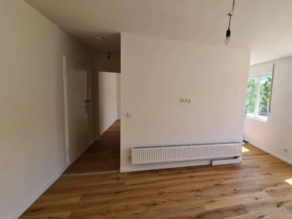 Completely Renovated Centrally Located 2-Room Apartment with Large Balcony