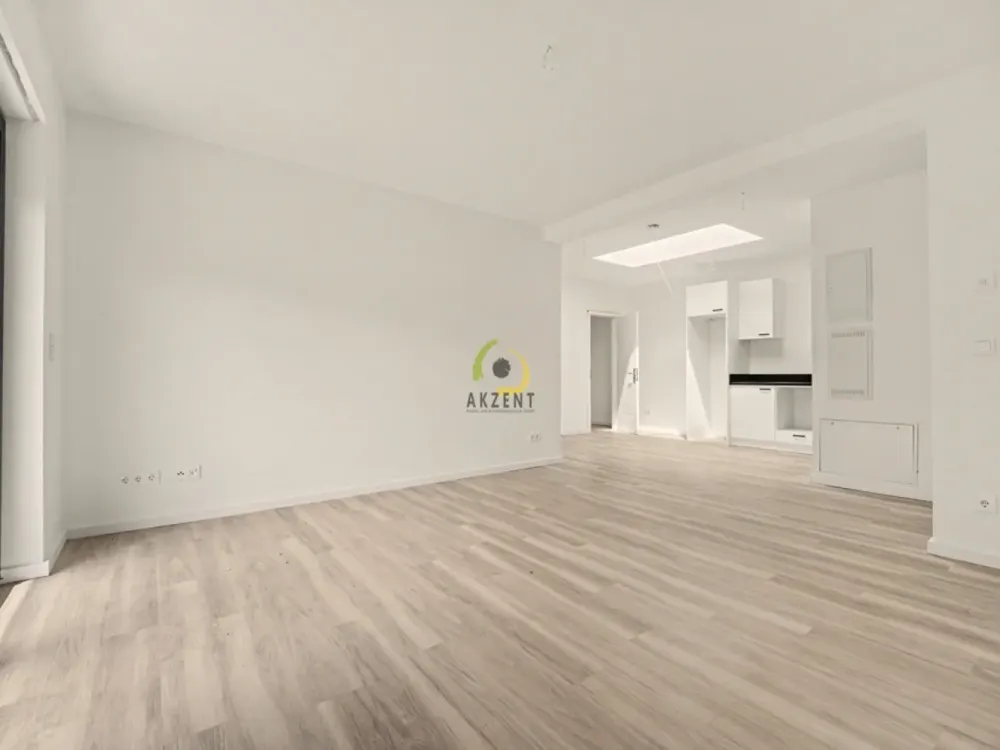 Erstbezug - Stilvolle 2-Zimmer-Neubauwohnung mit Balkon, EBK & Möblierung - Direkt am S-Bahnhof