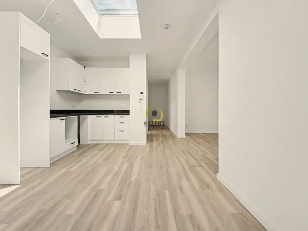 Erstbezug - Stilvolle 2-Zimmer-Neubauwohnung mit Balkon, EBK & Möblierung - Direkt am S-Bahnhof