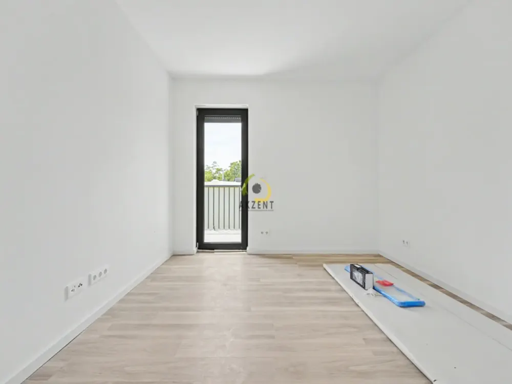 Erstbezug - Stilvolle 2-Zimmer-Neubauwohnung mit Balkon, EBK & Möblierung - Direkt am S-Bahnhof