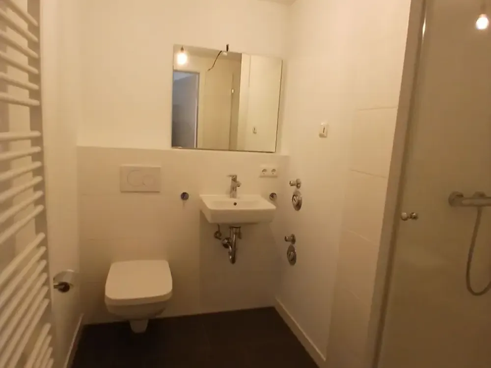 Aufzug, Fußbodenheizung & Balkon: 4 Zimmer mit 3 Schlafzimmern in Hamburg