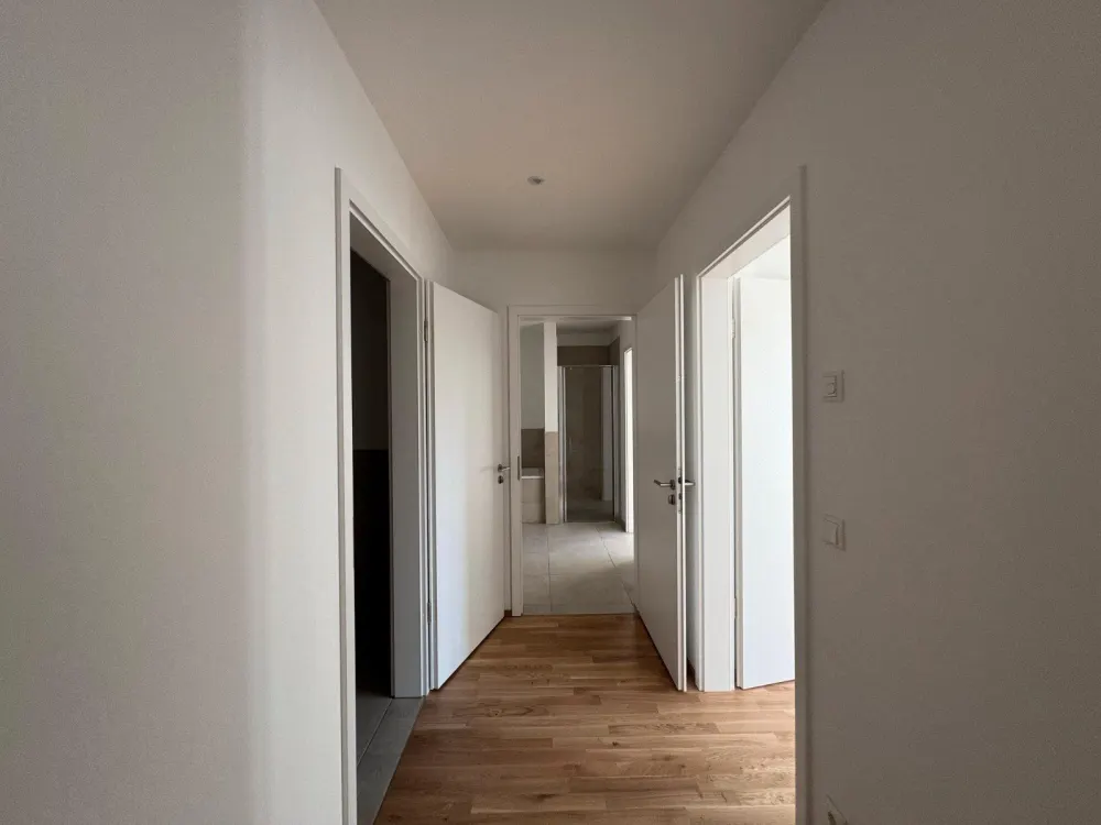 2026-20 Exclusive 4-Room New-Build Apartment with Winter Garden, High-Quality Features and Underground Parking Space in Prime City Centre Location