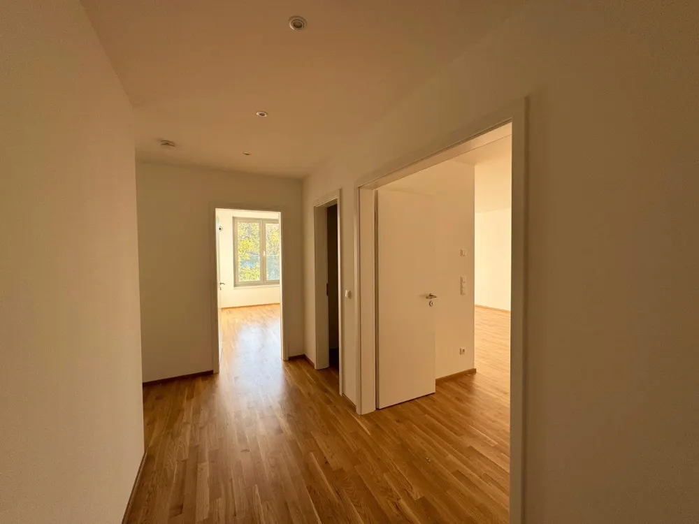 2026-20 Exclusive 4-Room New-Build Apartment with Winter Garden, High-Quality Features and Underground Parking Space in Prime City Centre Location