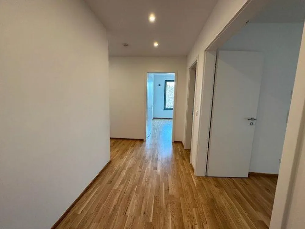 2026-20 Exclusive 4-Room New-Build Apartment with Winter Garden, High-Quality Features and Underground Parking Space in Prime City Centre Location