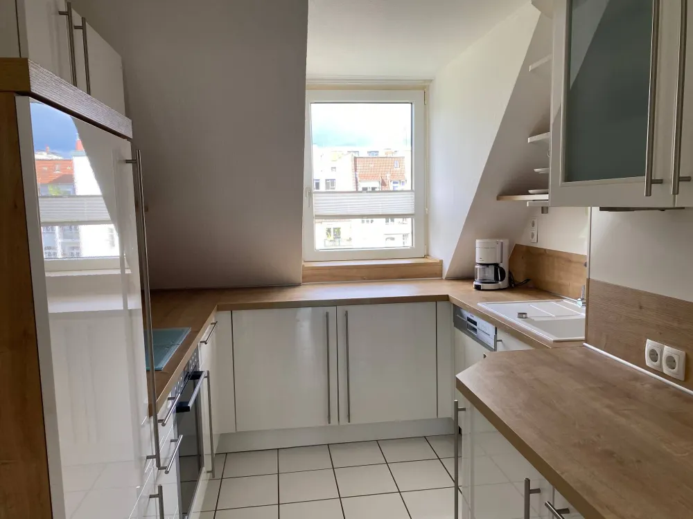 Elegant Attic Apartment in a Desirable Location