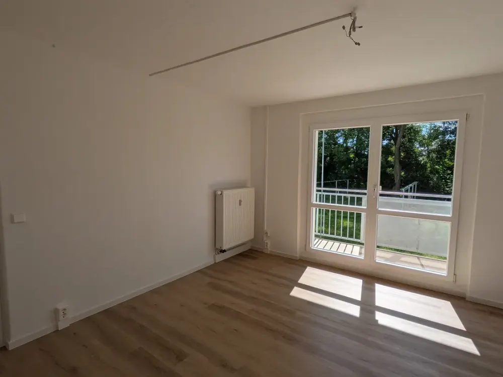Bright Renovated Apartment with Balcony and View of the Green Surroundings