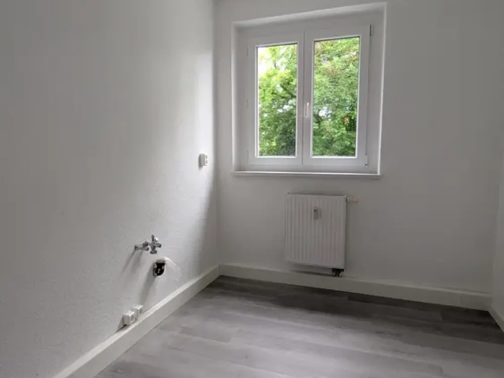 Bright Renovated Apartment with Balcony and View of the Green Surroundings