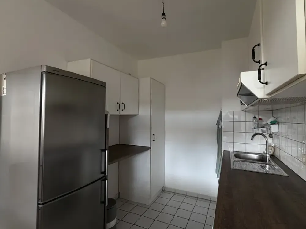Charmante 2-Zimmer-Wohnung mit großem Balkon & Fußbodenheizung im gepflegten Mehrfamilienhaus