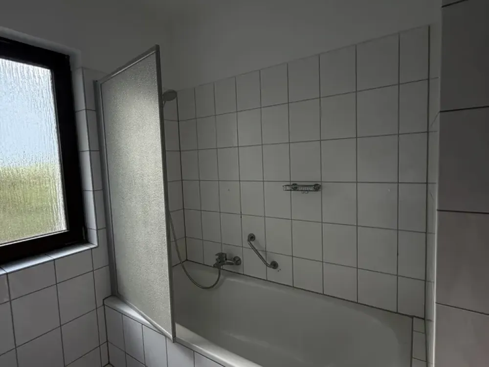 Charmante 2-Zimmer-Wohnung mit großem Balkon & Fußbodenheizung im gepflegten Mehrfamilienhaus